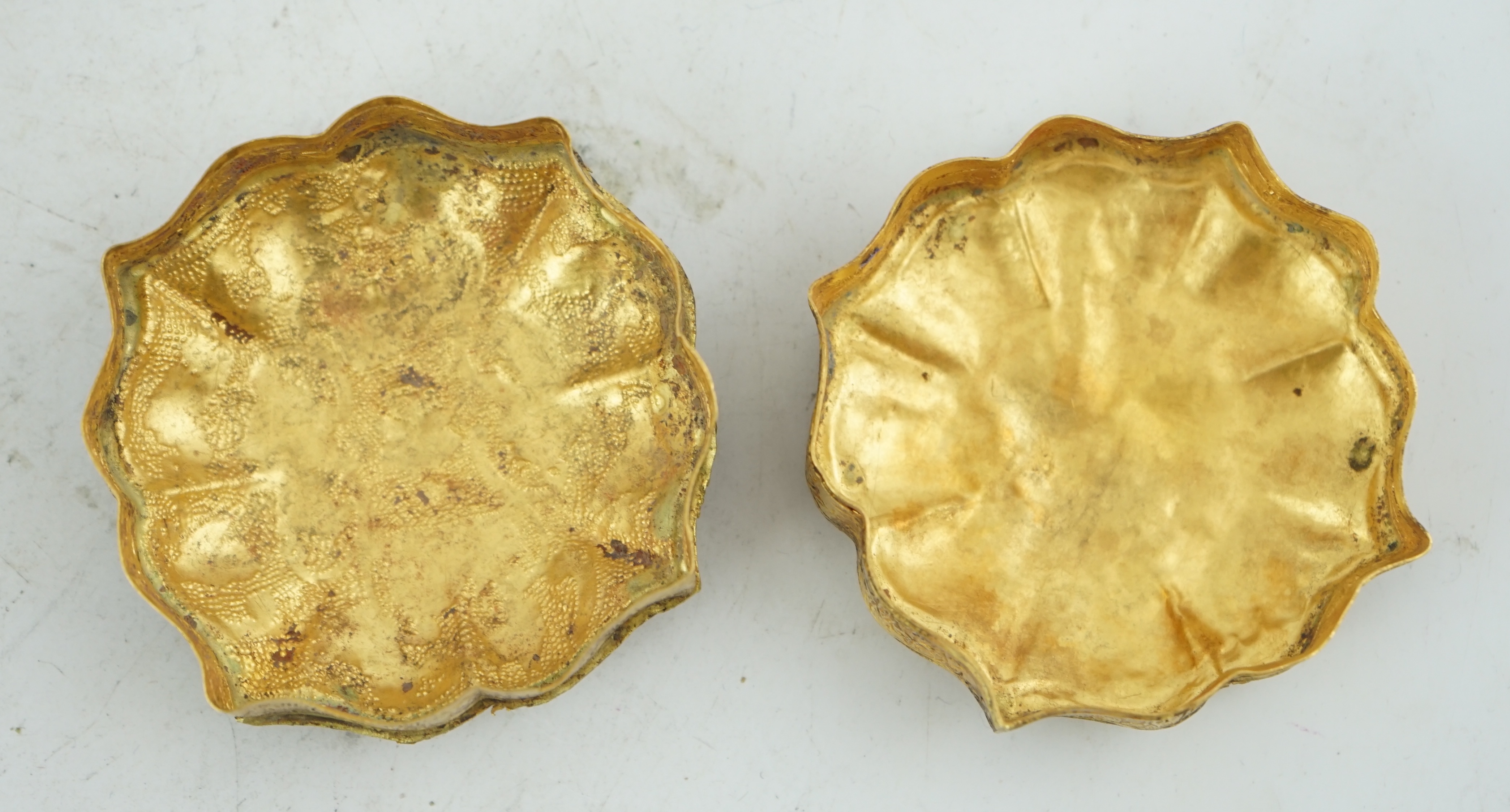 A Chinese gilt metal repoussé work box and cover, Liao dynasty style